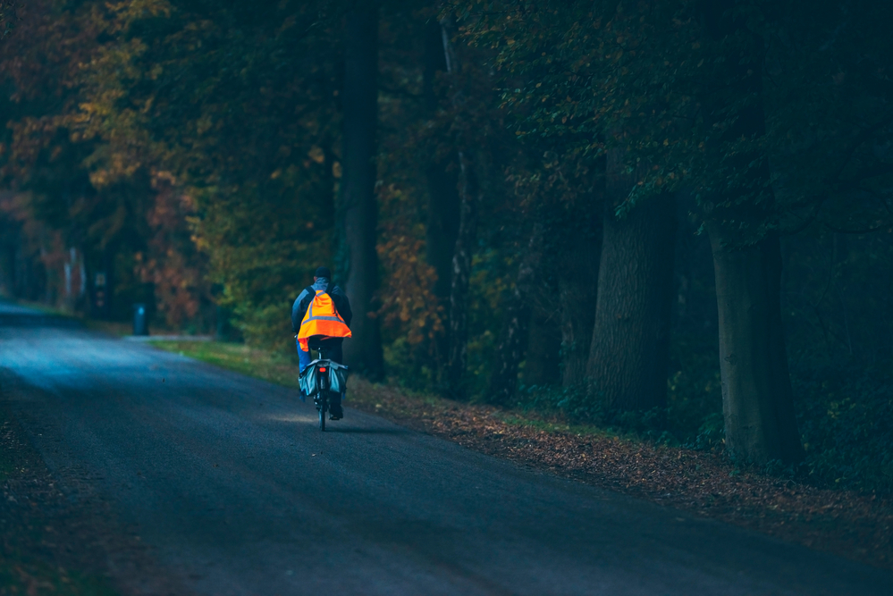 man-cycling-dark-netherlands