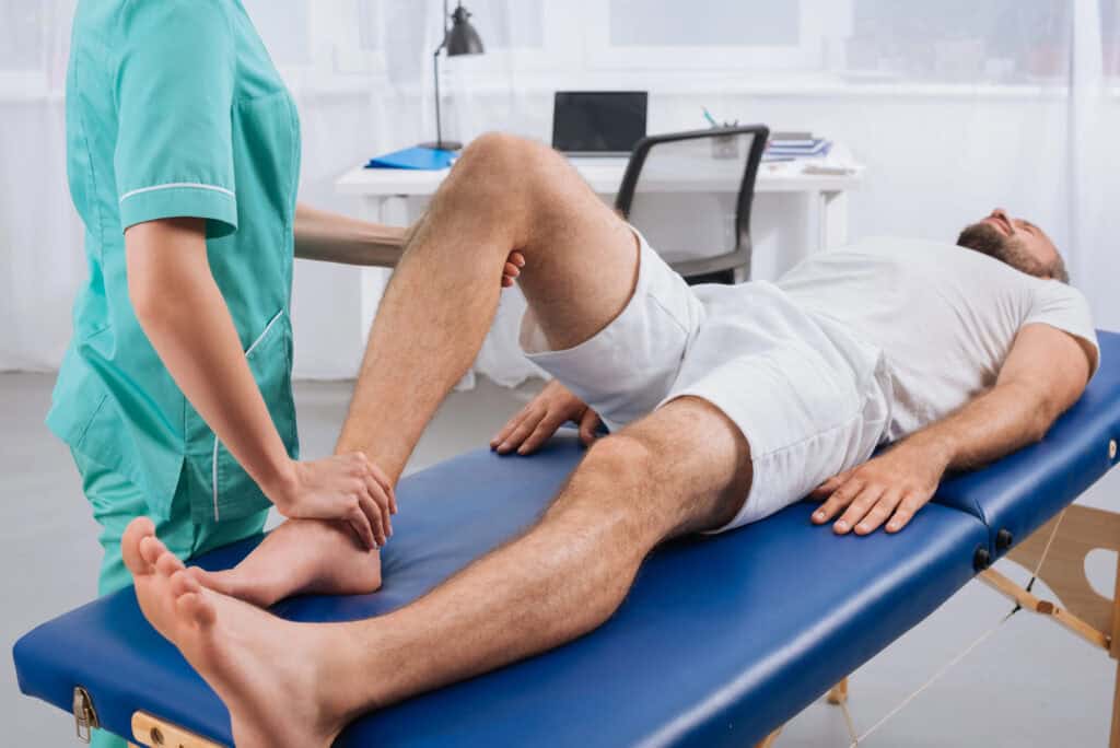 man-getting-examined-at-physiotherapist-office-in-the-netherlands