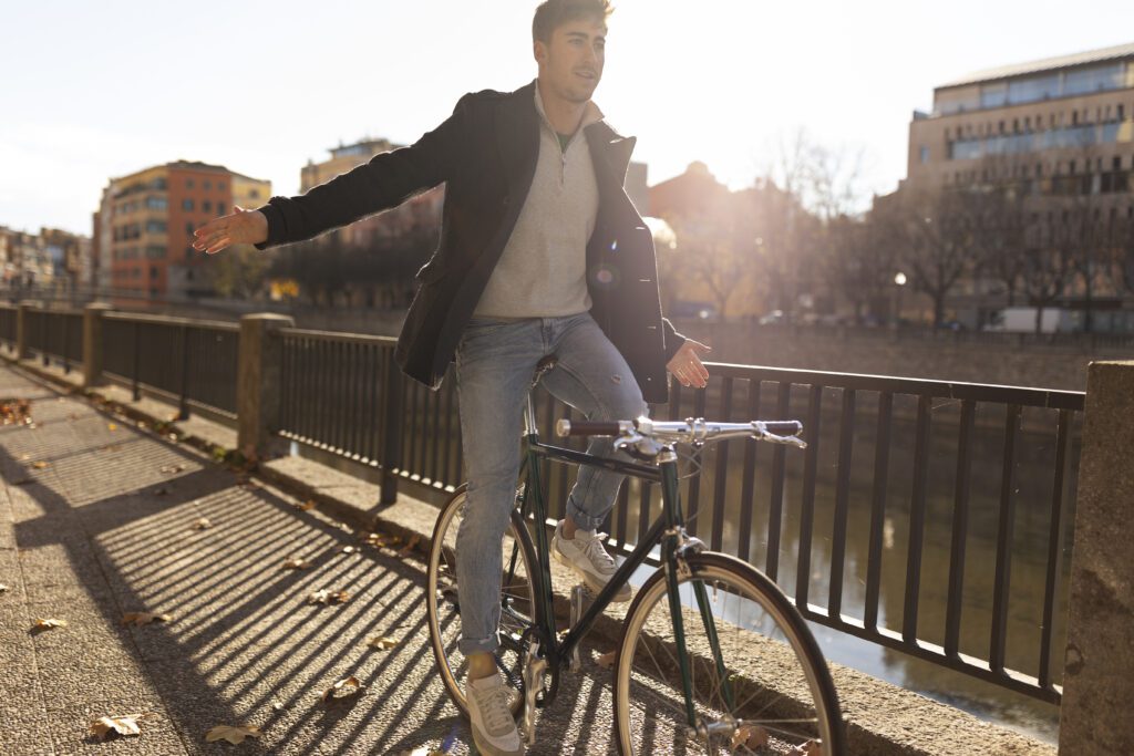 Man-giving-directions-while-biking-with-hand-netherlands