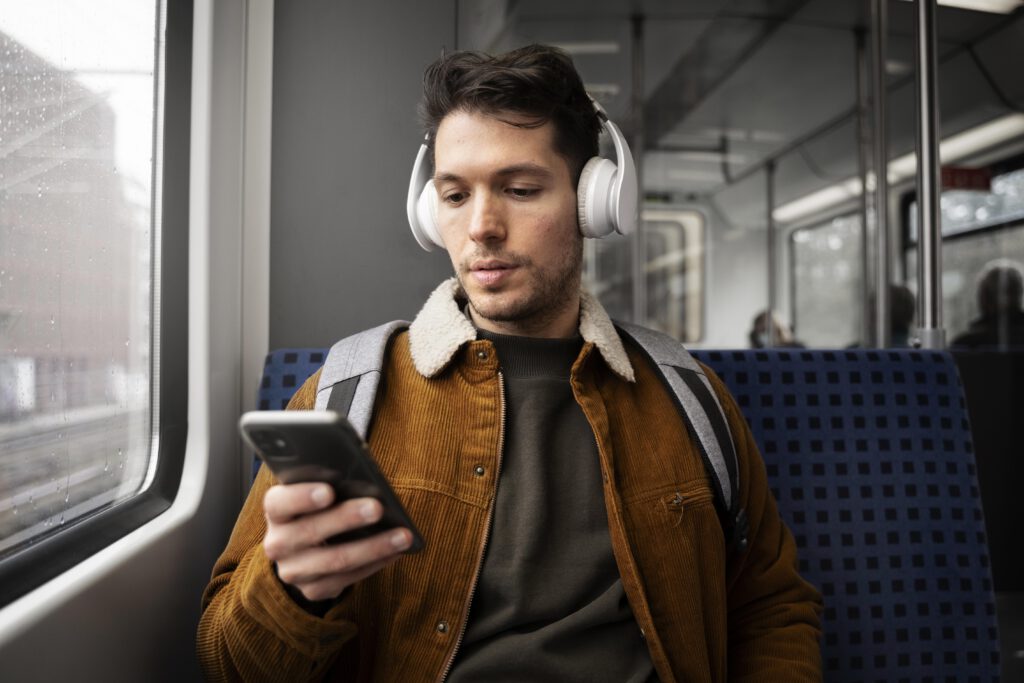 man-on-dutch-tram-staying-connected-with-lebara-phone-subscription