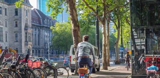 photo-of-man-in-hague-riding-bike-after-moving-to-netherlands