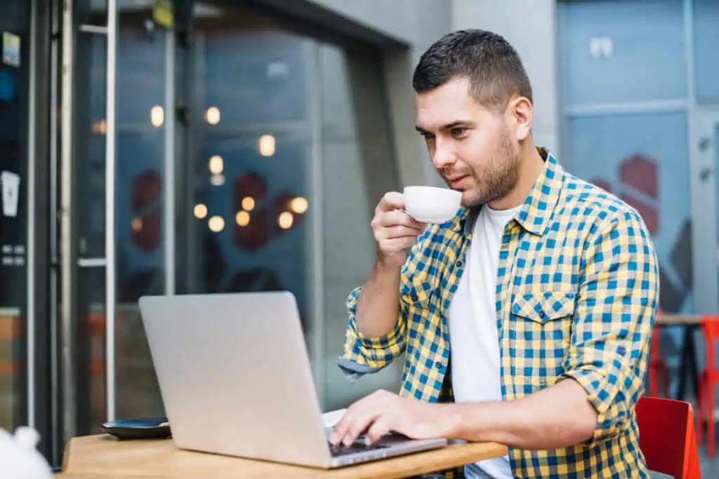 man-sipping-coffee-as-he-sets-up-a-business-in-the-netherlands-as-an-expat-budget-day-changes-2027