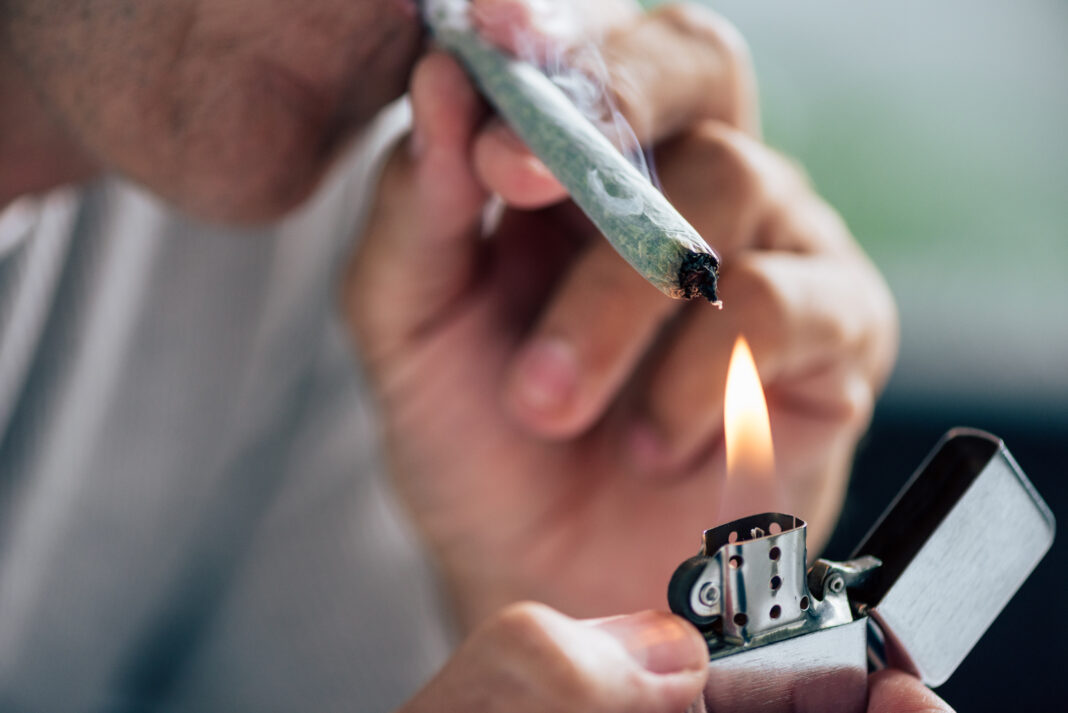 man-smoking-organic-cannabis-in-rotterdam-coffeeshop