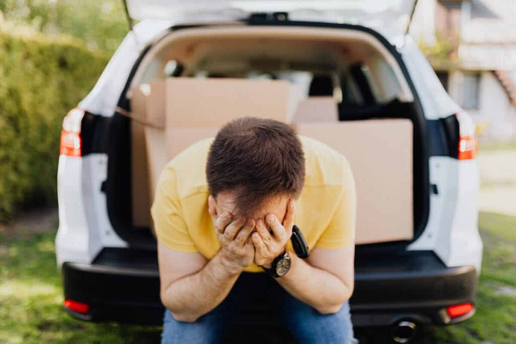 photo-of-stressed-out-man-going-through-housing-rental-scam-netherlands