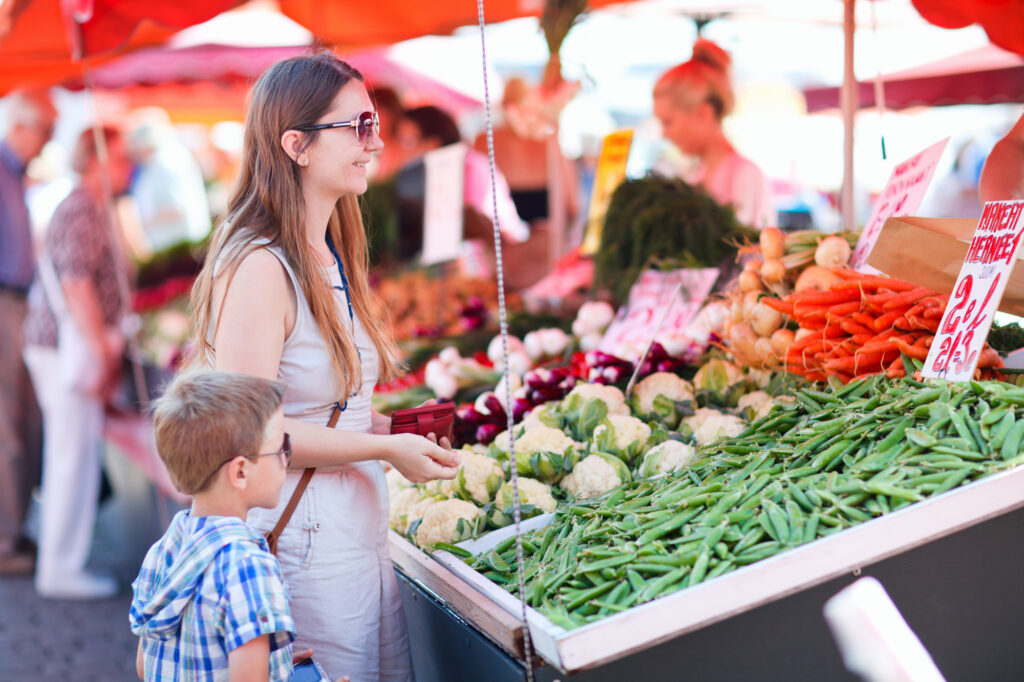 mom-and-son-at-market