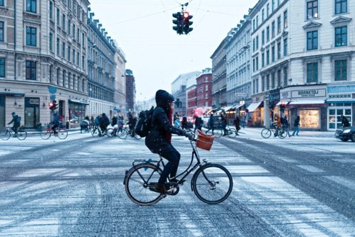 cycling-through-a-snowy-city