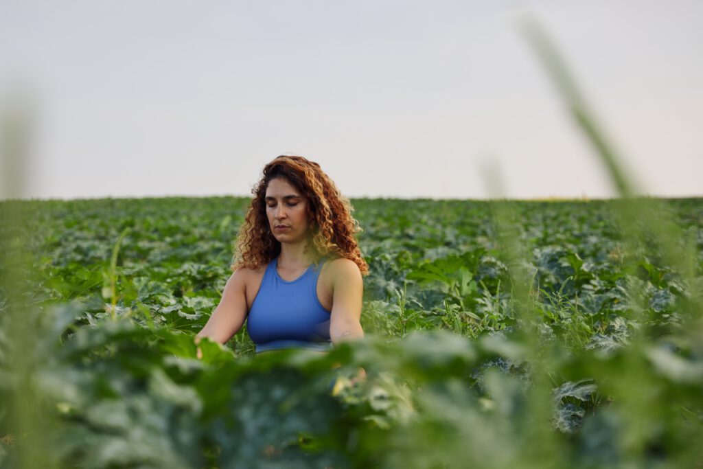 Photo-of-woman-relaxing-outside-meditating