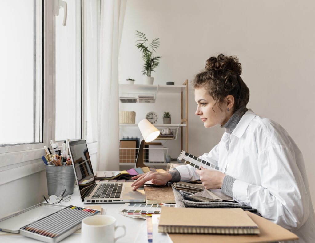 medium-shot-woman-working-with-laptop-working-remotely-from-home-in-the-netherlands