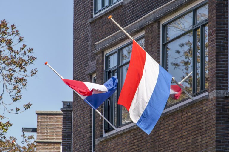 two-flags-on-remembrance-day-netherlands-rotterdam-may-4