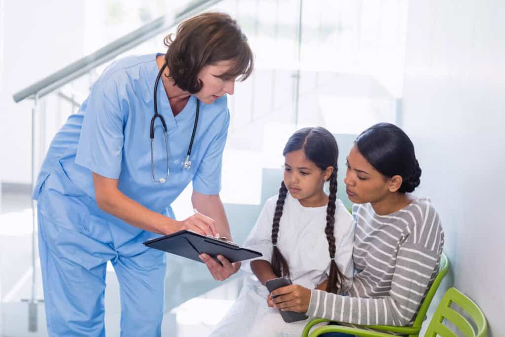 photo-of-nurse-in-the-netherlands-discussing-medical-report-with-woman-patient-not-allowed-to-work-too-many-hours