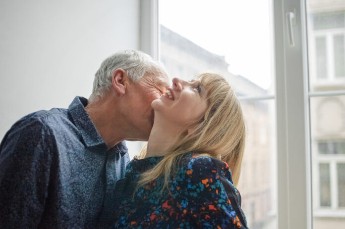 Older-people-having-more-sex-in-the-Netherlands-older-man-kissing-middle-aged-woman