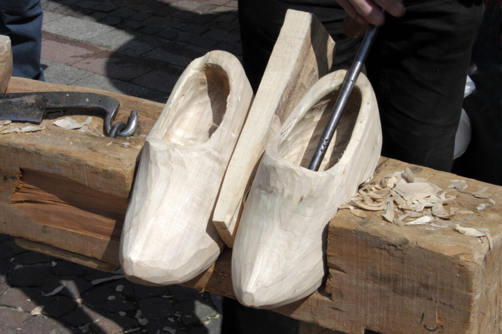 photo-of-pair-of-wooden-clog-shoes-being-carved