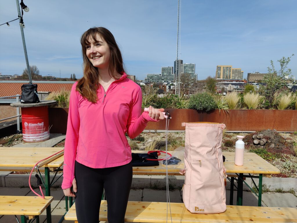 photo-christine-holding-pakama-speed-rope-after-workout-on-rooftop