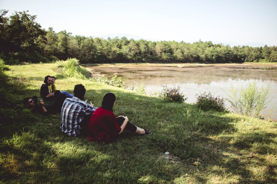 photo-of-friends-having-a-picnic-in-a-park-in-the-netherlands