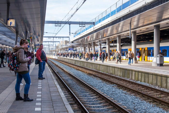 photo-of-passengers-waiting-for-train-at-dutch-station