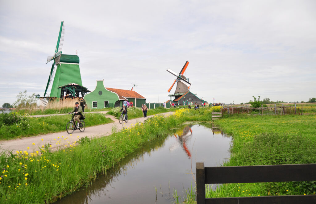 photo-of-people-on-bikes-cycling-around-the-zaanse-schans