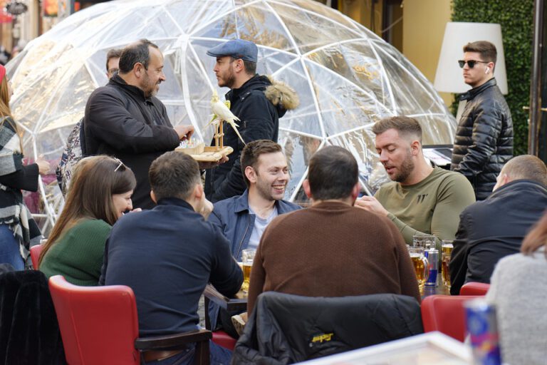 Bars and restaurants struggle to maintain social distancing; fines handed out over the weekend