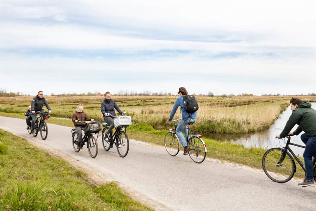 
people-cycling-around-the-zaanstreek-on-bike-tour-around-amsterdam