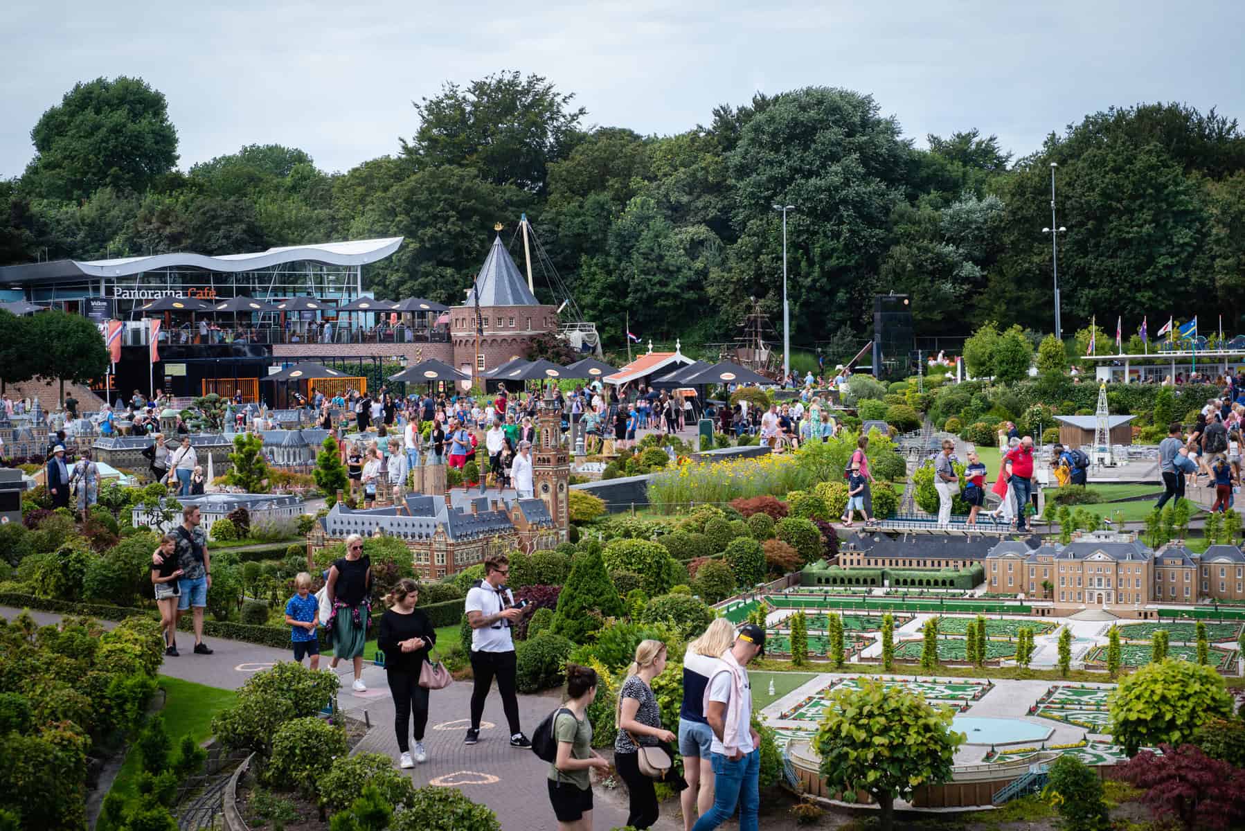 photo-of-visitors-exploring-magical-miniature-world-of-madurodam-park-in-the-hague-netherlands