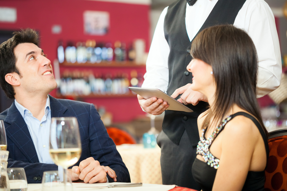 Man-and-woman-ordering-food-at-a-resaurant