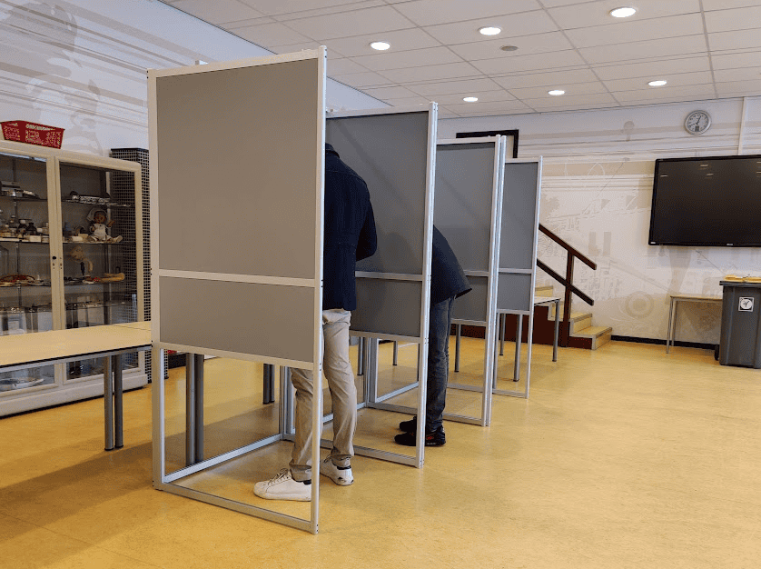 people-voting-in-municipal-elections-in-the-netherlands-in-separate-cubicles