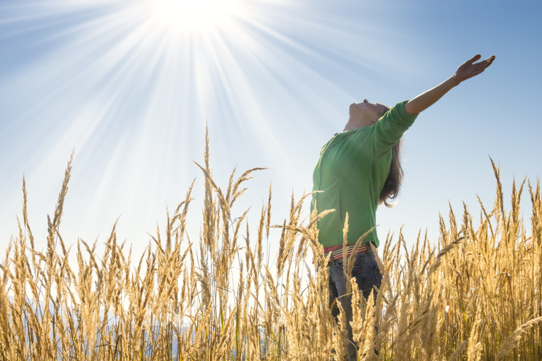 happy-woman-in-grass