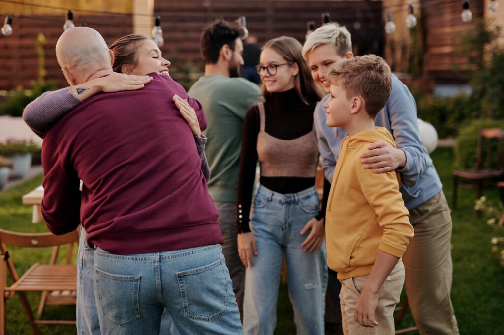 Photo-of-people-embracing-each-other-greeting-each-other-at-Dutch-birthday-party