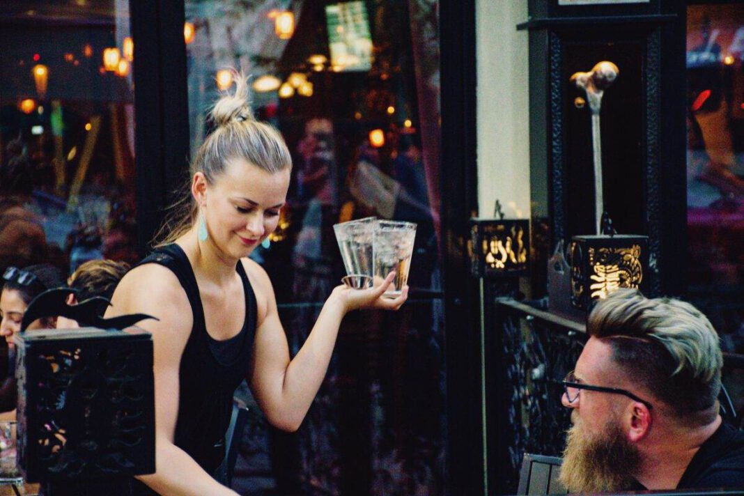 photo-of-a-waitress-serving-beer-in-a-dutch-restaurant
