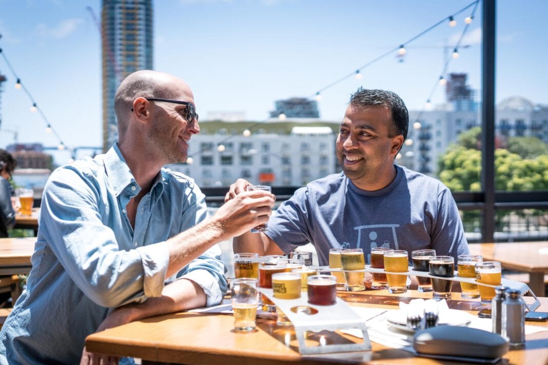 photo-of-two-men-beer-tasking