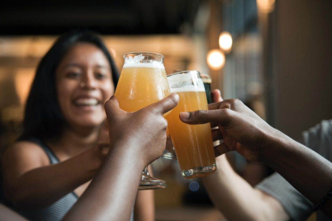 Dutch-people-toasting-new-coronavirus-relaxations-with-beer
