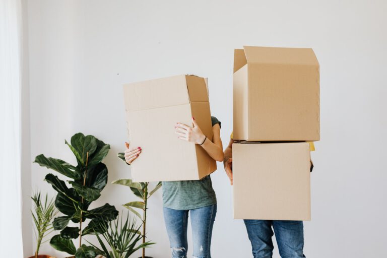 Photo-of-people-holding-boxes-getting-a-mortgage