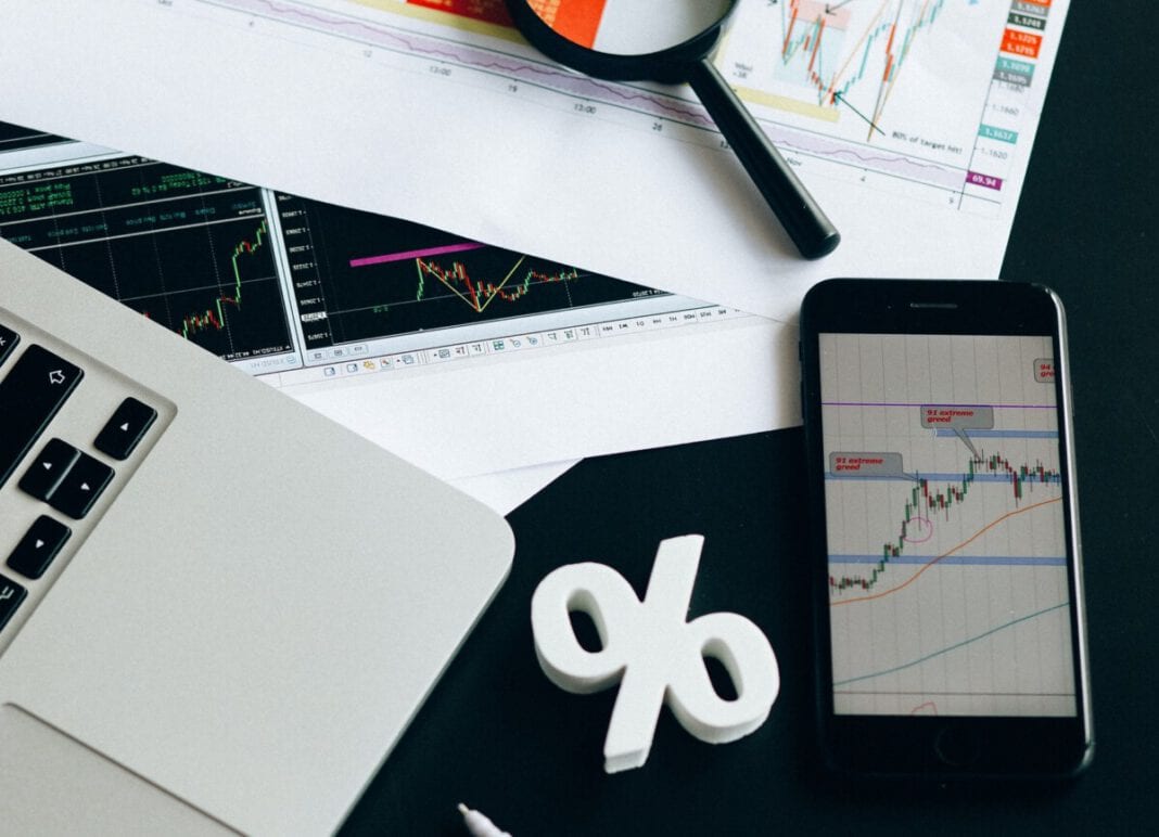 photo-of-iphone-on-table-stocks-finance