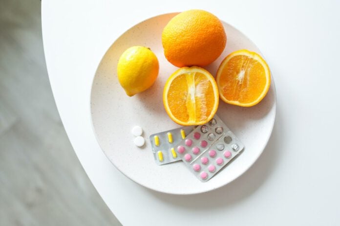 plate with medicine and oranges