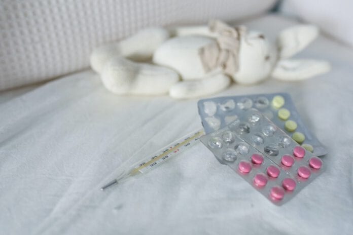 Photo-of-medication-on-child's-bed