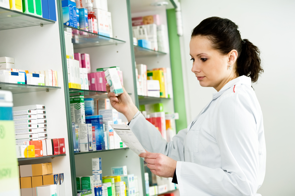 photo-of-dutch-pharmacist-studying-prescription-for-medication-at-a-pharmacy-in-the-netherlands