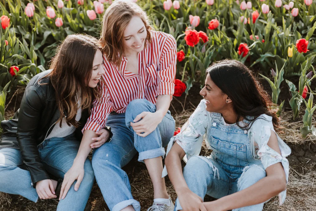 Dutch-women-laughing-together-near-flowers