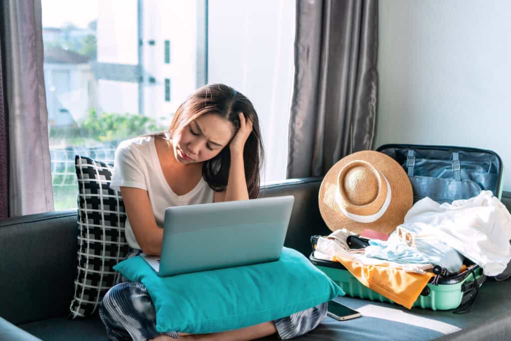 Photo-of-a-woman-being-stressed-about-her-luggage-before-flying