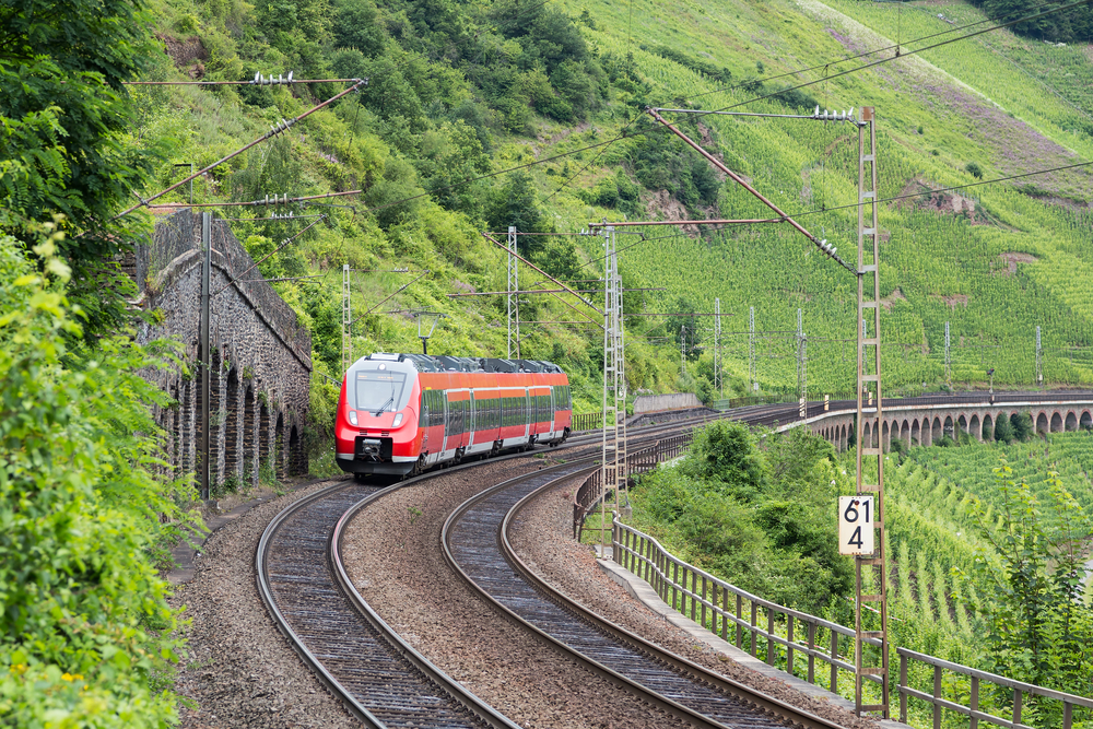 photograph-of-a-train-driving-through-the-moselle-region-in-germany