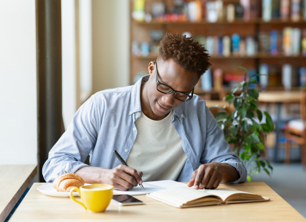 picture-of-an-international-student-studying-in-a-dutch-cafe-