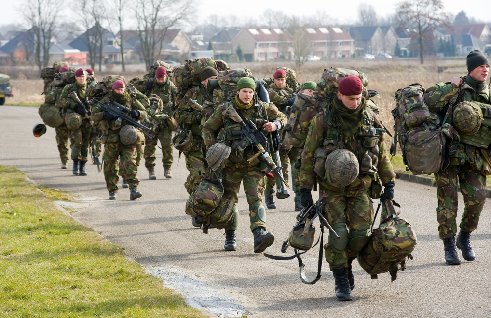 picture-of-dutch-military-soldiers-in-uniform-walking-on-road-in-netherlands
