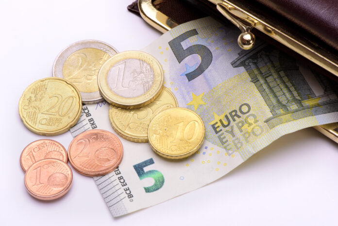 picture-of-euro-coins-and-dollar-coming-out-of-wallet