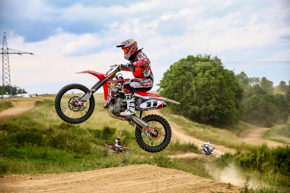 picture-of-person-in-gear-doing-jump-on-motocross-track-in-netherlands