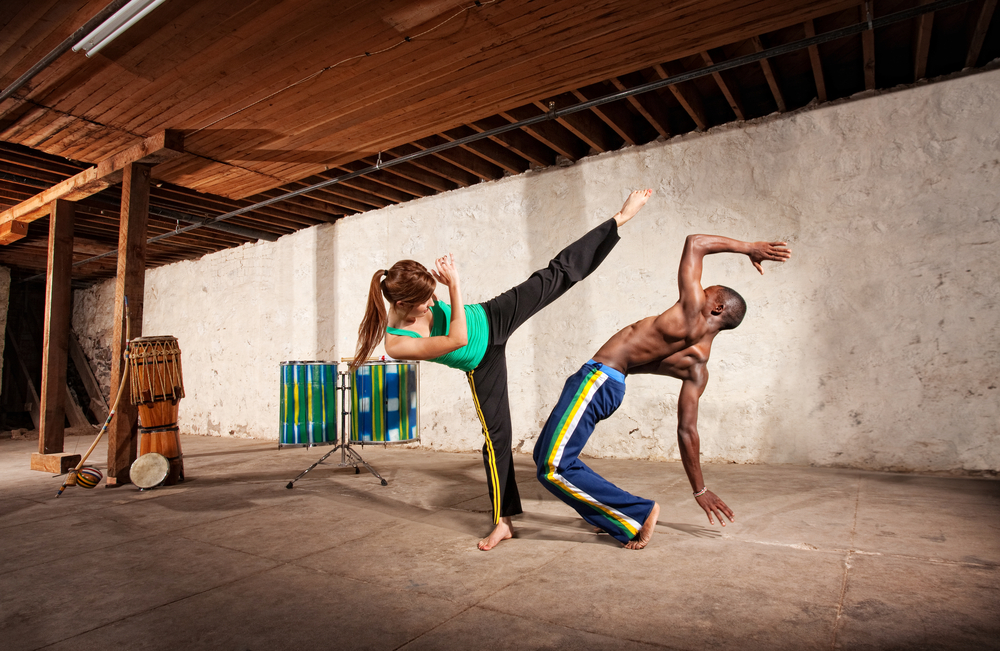picture-of-woman-and-man-doing-capoeira-brazilian-martial-art-international-sport-netherlands