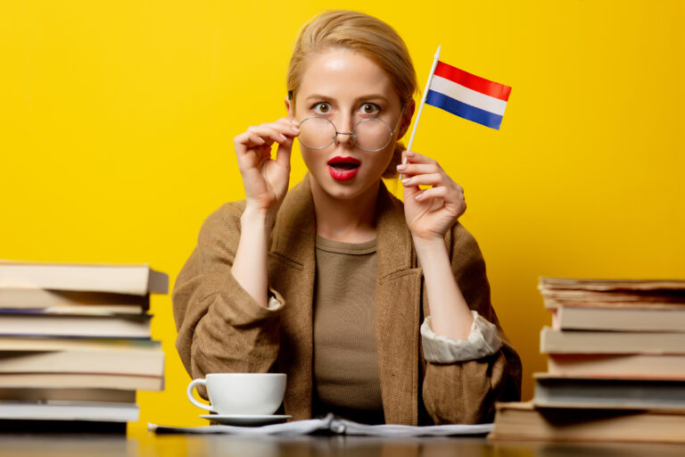 photo-of-dutch-woman-holding-flag-looking-quirky