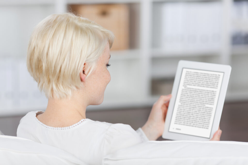 Photo-of-woman-reading-ebook-a-waste-free-alternative