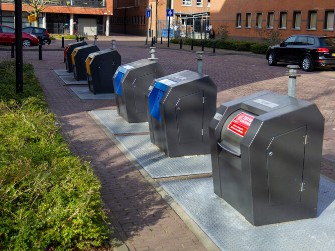 Recycling-point-in-the-netherlands-with-different-coloured-bins