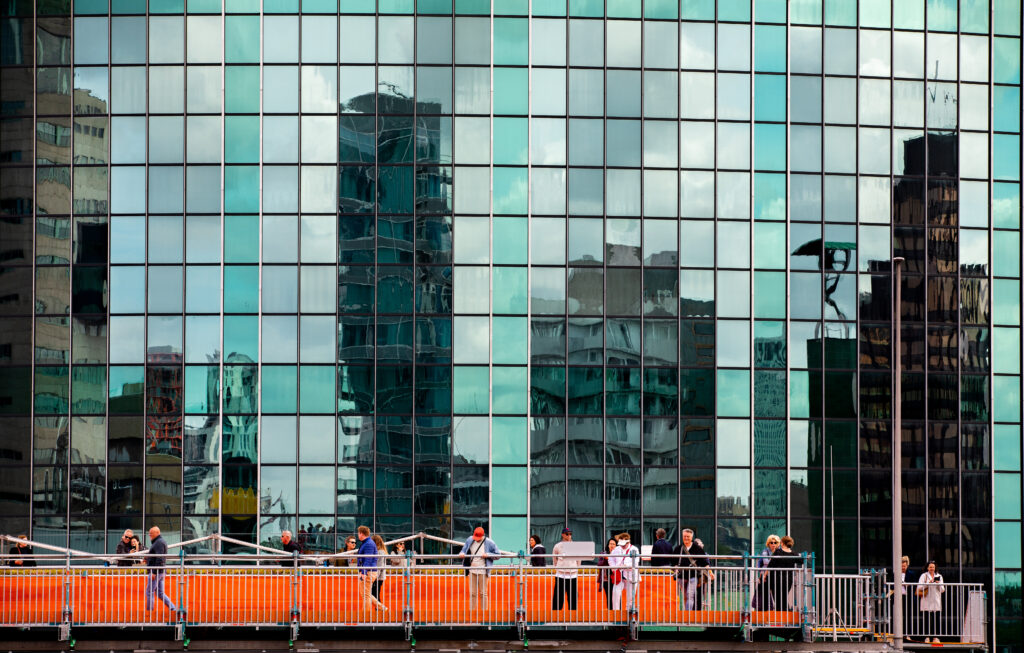 photo-people-on-platform-amongst-rotterdams-skyscrapers