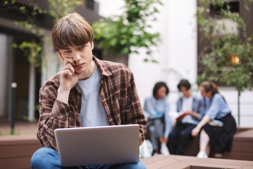 student-staring-at-the-camera-on-laptop-while-doing-internship-in-the-Netherlands