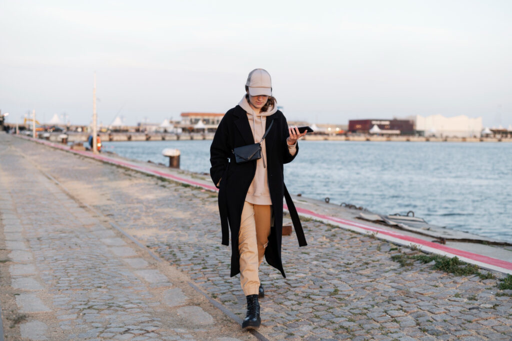 photo-of-woman-walking-along-water-in-the-Netherlands