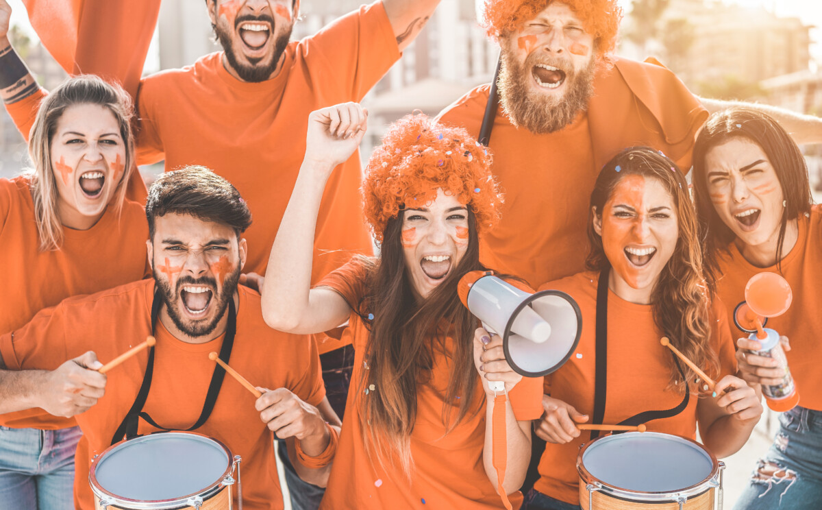 photo-of-dutch-fans-wearing-orange-cheering